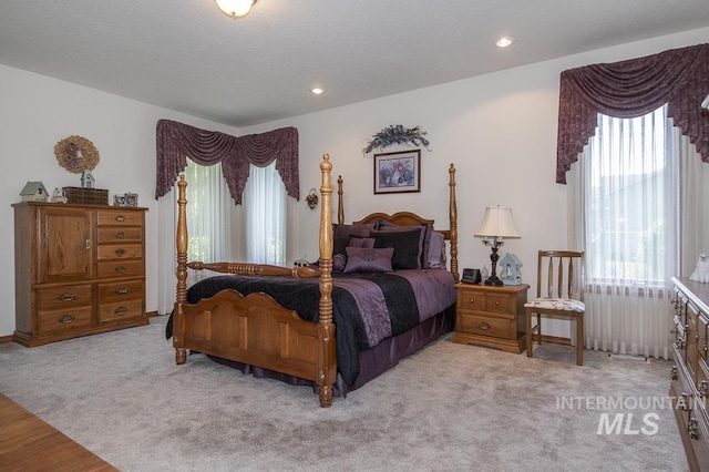 2555 E Quail Run Rd, Emmett, ID 83617 - carpeted bedroom with multiple windows and recessed lighting