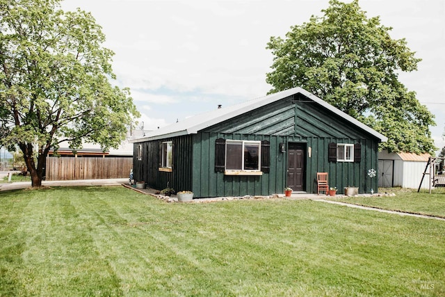 421 Hill St, Grangeville, ID 83530 - view of front of property with board and batten siding, a shed, and an outdoor structure