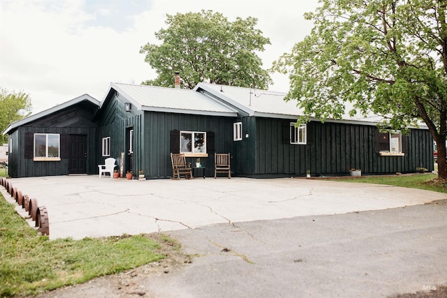 421 Hill St, Grangeville, ID 83530 - back of house with board and batten siding and metal roof