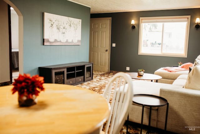 421 Hill St, Grangeville, ID 83530 - dining area with arched walkways and a textured ceiling