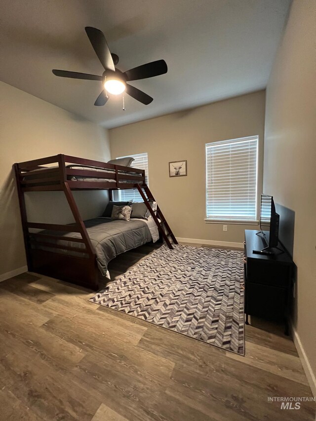 720 Shadowleaf Ave, Twin Falls, ID 83301 - bedroom with wood finished floors, baseboards, and a ceiling fan
