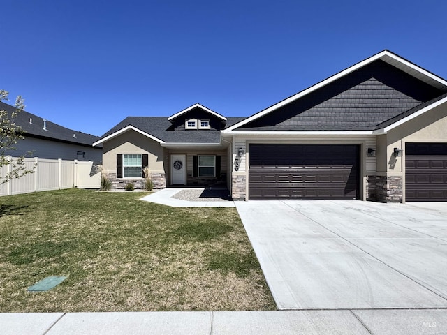 720 Shadowleaf Ave, Twin Falls, ID 83301 - craftsman-style home featuring stone siding, a garage, and driveway