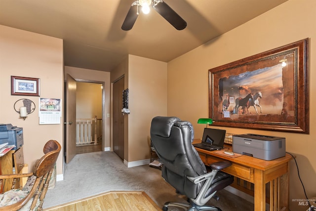 office area with ceiling fan and light colored carpet