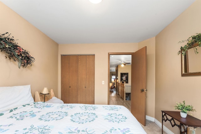 carpeted bedroom with a closet