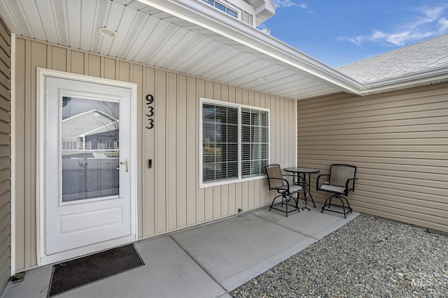 property entrance with a patio area