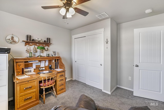 office area featuring ceiling fan and light colored carpet