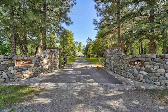 1301 Glen Aspen Dr, Bellevue, ID 83313 - view of asphalt driveway featuring a gated entry and a gate
