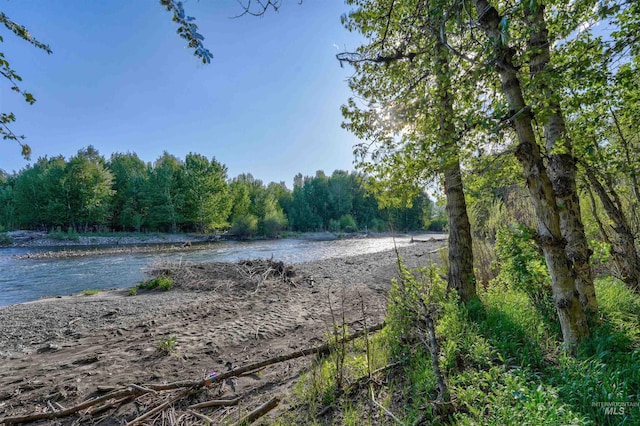 1301 Glen Aspen Dr, Bellevue, ID 83313 - water view with a heavily wooded area