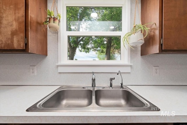 5009 Airport Rd, Nampa, ID 83687 - kitchen with a sink and light countertops