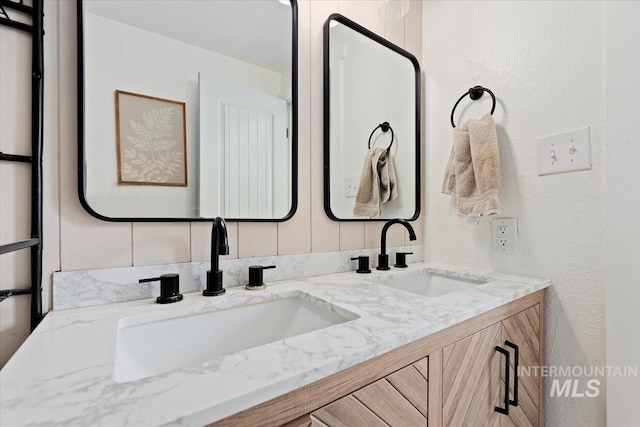 5009 Airport Rd, Nampa, ID 83687 - full bath with double vanity and a textured wall