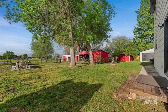 5009 Airport Rd, Nampa, ID 83687 - view of grassy yard with an outdoor structure