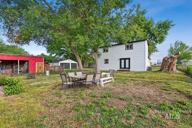 5009 Airport Rd, Nampa, ID 83687 - back of house with an outbuilding and central AC unit