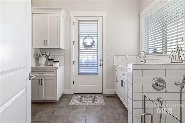 doorway featuring visible vents and a sink