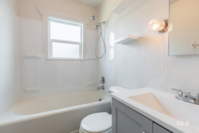 full bathroom with washtub / shower combination, vanity, and toilet