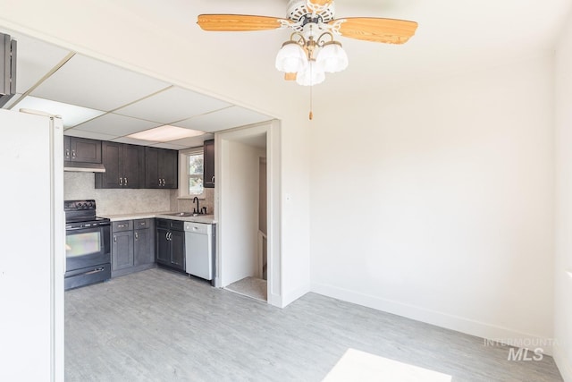 kitchen with sink, dark brown cabinets, light hardwood / wood-style flooring, white appliances, and decorative backsplash