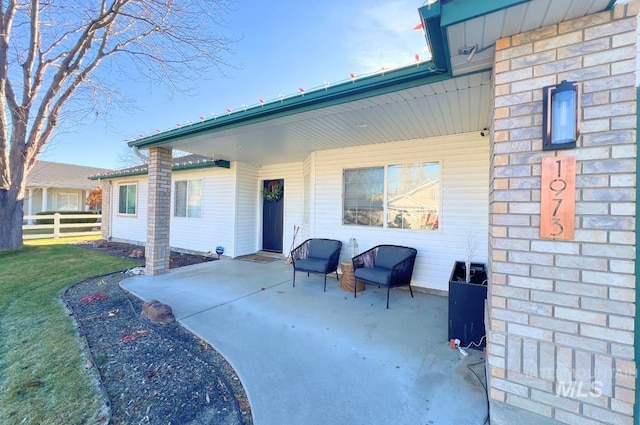 rear view of house with a patio area