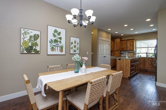 2018 S Sandcrest Loop, Nampa, ID 83686 - dining area with a chandelier, recessed lighting, and dark wood finished floors