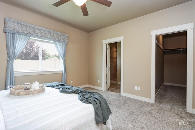 2018 S Sandcrest Loop, Nampa, ID 83686 - bedroom featuring a spacious closet, carpet, a closet, connected bathroom, and ceiling fan