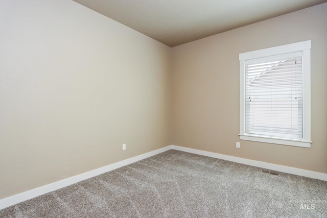 2018 S Sandcrest Loop, Nampa, ID 83686 - unfurnished room featuring light carpet and baseboards