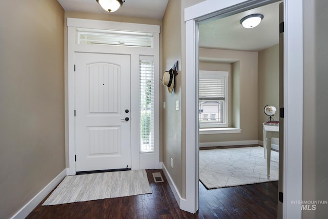 2018 S Sandcrest Loop, Nampa, ID 83686 - entrance foyer with dark wood-style flooring and baseboards