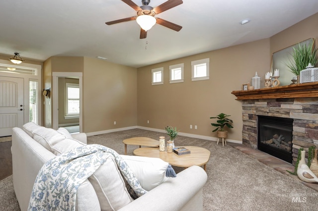 2018 S Sandcrest Loop, Nampa, ID 83686 - carpeted living area with a ceiling fan and a fireplace