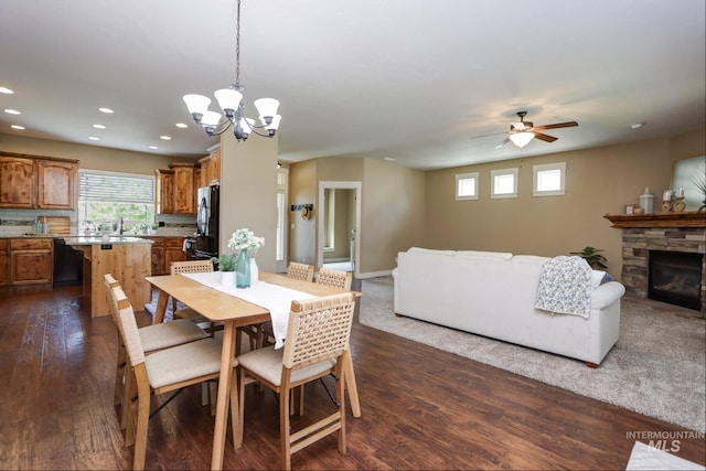 2018 S Sandcrest Loop, Nampa, ID 83686 - dining room with plenty of natural light, recessed lighting, dark wood-type flooring, ceiling fan, and a chandelier