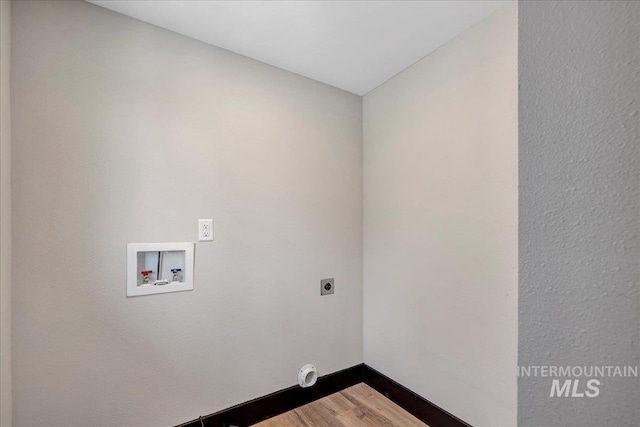 327 Adams St, Twin Falls, ID 83301 - laundry area featuring dark wood-style floors, electric dryer hookup, and hookup for a washing machine