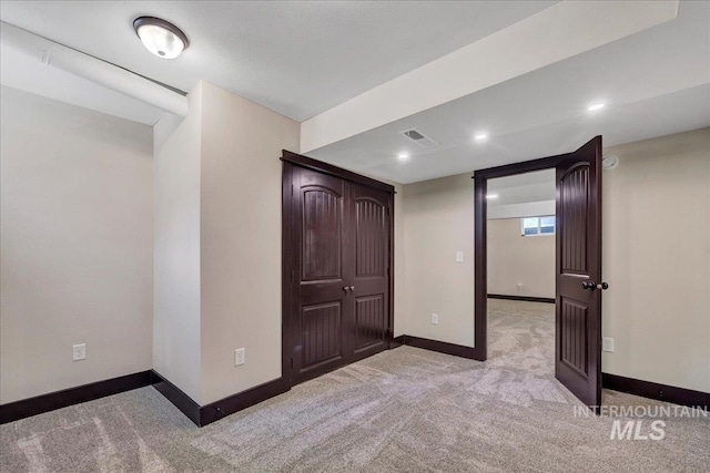 327 Adams St, Twin Falls, ID 83301 - unfurnished bedroom featuring light colored carpet and recessed lighting