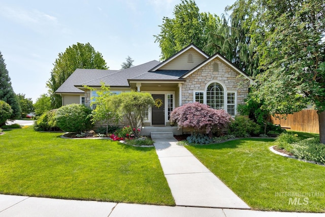 9407 W Pebblestream Dr, Boise, ID 83709 - view of front facade with stone siding and a shingled roof