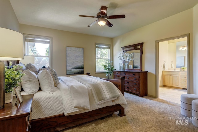 9407 W Pebblestream Dr, Boise, ID 83709 - bedroom featuring light colored carpet, ensuite bathroom, and ceiling fan