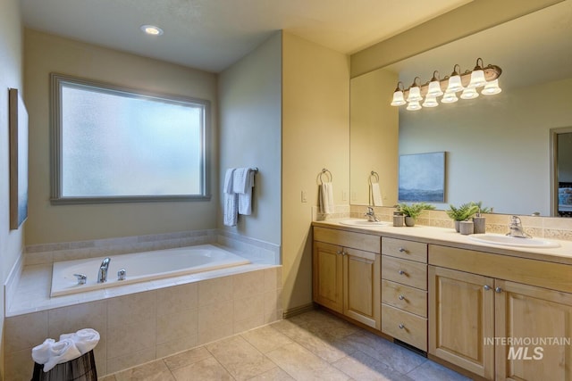9407 W Pebblestream Dr, Boise, ID 83709 - bathroom with double vanity, a garden tub, and tile patterned floors