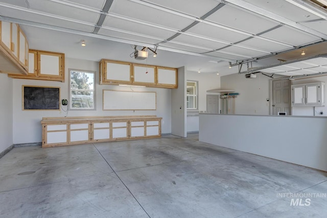 9407 W Pebblestream Dr, Boise, ID 83709 - garage featuring a garage door opener