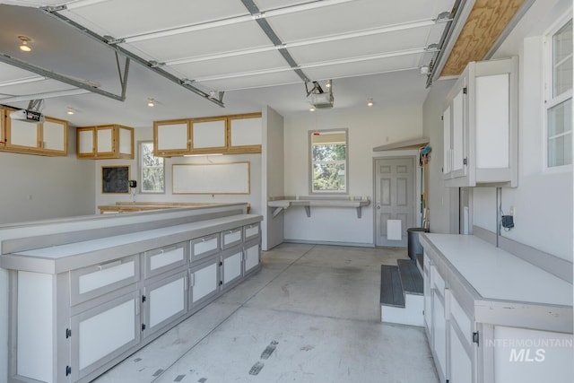 9407 W Pebblestream Dr, Boise, ID 83709 - garage featuring a garage door opener