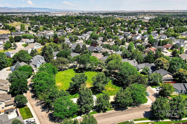 9407 W Pebblestream Dr, Boise, ID 83709 - aerial perspective of suburban area featuring a mountainous background