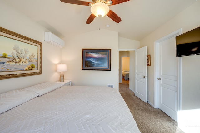 bedroom with light colored carpet, visible vents, a ceiling fan, an AC wall unit, and vaulted ceiling