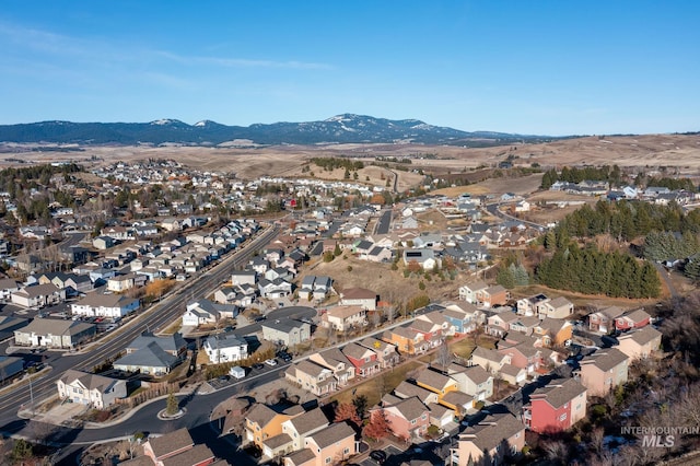 aerial view featuring a mountain view and a residential view