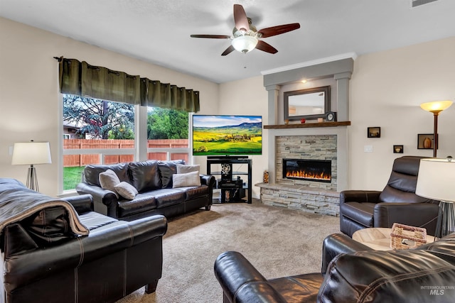 1390 E Prohaska Ct, Eagle, ID 83616 - living room with carpet, plenty of natural light, ceiling fan, and a stone fireplace