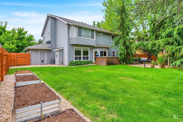 1390 E Prohaska Ct, Eagle, ID 83616 - back of house with a vegetable garden, a patio, and a fenced backyard