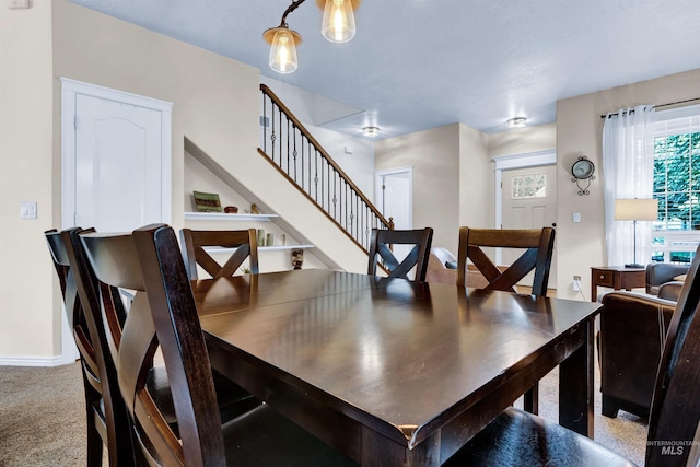 1390 E Prohaska Ct, Eagle, ID 83616 - dining space with stairway and carpet flooring