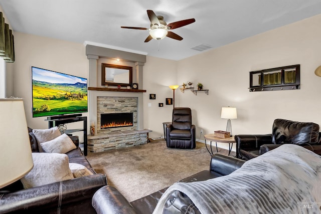 1390 E Prohaska Ct, Eagle, ID 83616 - living room with carpet flooring, a fireplace, and a ceiling fan