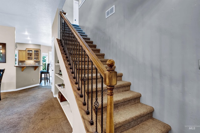 1390 E Prohaska Ct, Eagle, ID 83616 - stairs with carpet flooring and baseboards