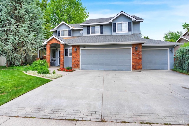 1390 E Prohaska Ct, Eagle, ID 83616 - view of front of property featuring concrete driveway, brick siding, a garage, roof with shingles, and a front yard