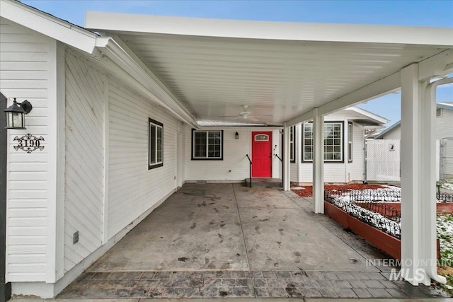 view of patio featuring ceiling fan