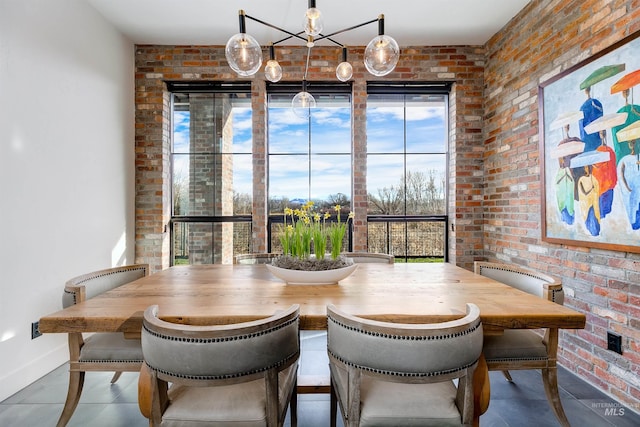 278 S Carbon Rivet Ave, Eagle, ID 83616 - dining room featuring brick wall and baseboards