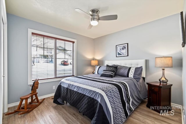 3499 S Green Basin Way, Nampa, ID 83686 - bedroom with light wood-style floors and ceiling fan