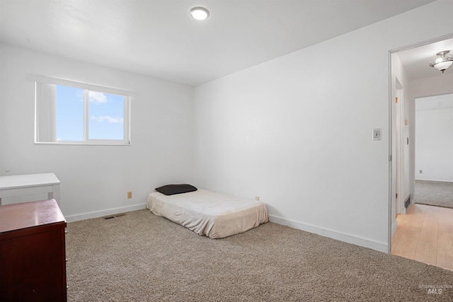 1520 R St, Heyburn, ID 83336 - bedroom with light carpet and baseboards