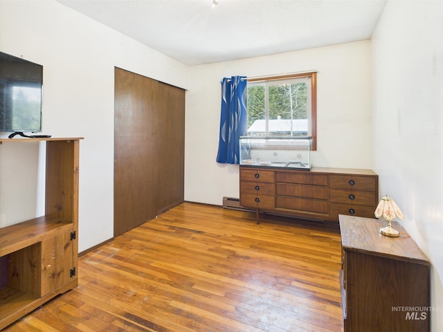 143 Timberline Dr, Pierce, ID 83546 - bedroom featuring a closet and hardwood / wood-style floors