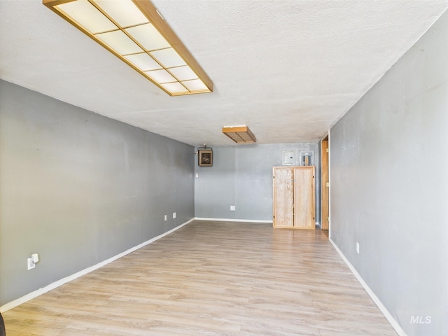 143 Timberline Dr, Pierce, ID 83546 - finished below grade area featuring baseboards and wood finished floors