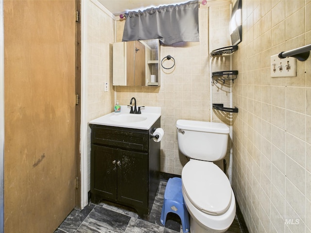 143 Timberline Dr, Pierce, ID 83546 - bathroom with tile walls, vanity, and toilet