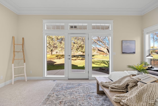 doorway with carpet flooring and ornamental molding